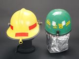 two helmets that are sitting next to each other on a table