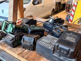 many tools that are sitting on a shelf in the garage