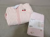 pink and white striped blanket with cherries and cherries on it