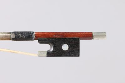 a close up of a violin bow on a white background