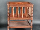 pair of antique wooden baby cribs with beaded sides