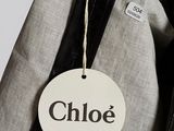 a label that says chloe hanging from a jacket