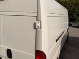 a white van that is parked in a lot