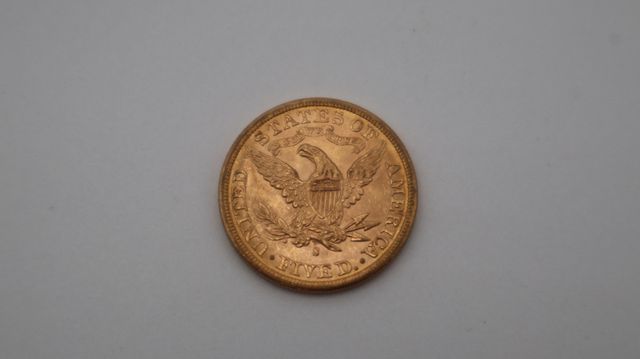 Une pièce de monnaie en or à valeur faciale de cinq dollars USA L...