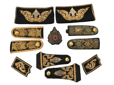 a lot of different types of military uniforms on a white background