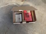 a box that has some items in it on the ground