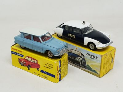 two toy cars that are sitting on top of each other