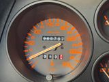 a close up of a speedometer in a car