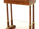 an image of a small wooden table with a drawer on top of it