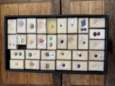 a picture of a display case with buttons and magnets