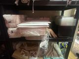 a shelf with many items on it in a room