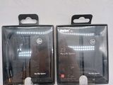 two boxes with a pair of headphones in them