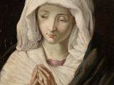 une image représentant un tableau où l'on voit une femme les mains jointes