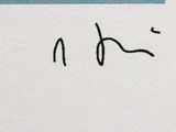 an image of a close up of a piece of paper with writing on it