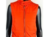 a close up of a mannequin mannequin wearing an orange vest