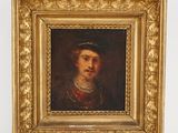 portrait of a man in a gold frame with a number 99
