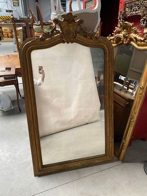 two mirrors sitting next to each other on the floor