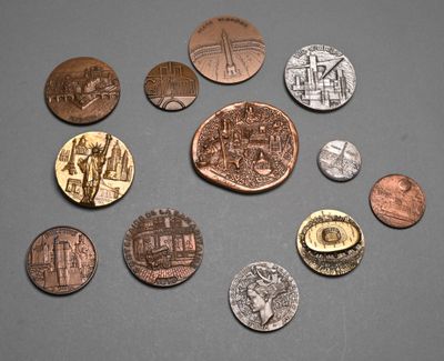 a lot of coins that are on the table