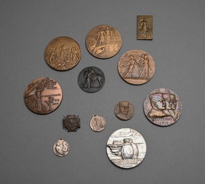 several coins are arranged in a circle on a gray surface