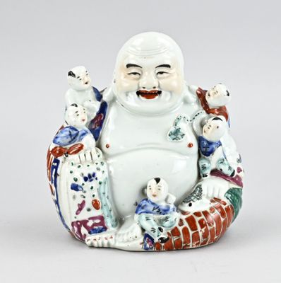 chinese figurine of a laughing buddha surrounded by other figurines