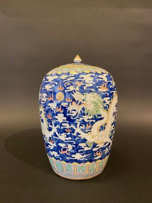 an image of a blue and white vase with a dragon on it