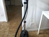an image of a hair dryer on a stand in a room
