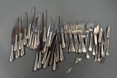 many forks and spoons laid out on the table