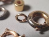 a close up of a bunch of rings on a table