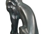 statue of a cat sitting on its hind legs on a white background