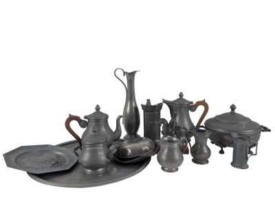 a lot of silver items that are on a tray
