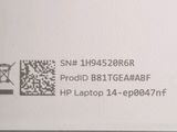 the back of a laptop with a qr code on it
