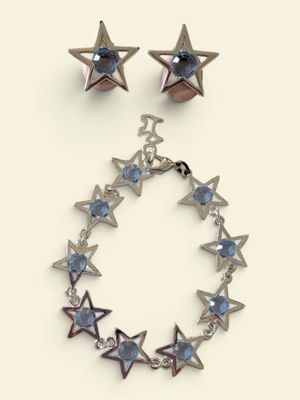 silver and blue star bracelet and earring set with swarovs