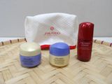 three different types of skin care products sitting on a basket