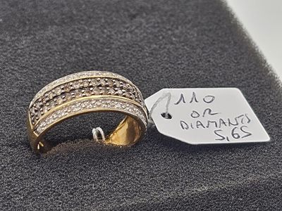 a picture of a ring with a tag on top of it