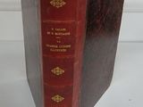 a red book that is sitting on a table