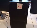 a computer on a desk with two monitors and a mouse