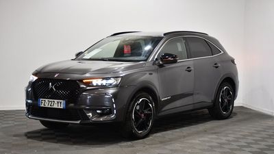 the new dsx suv is parked in a showroom