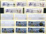 a lot of stamps that are on display on a table
