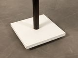 an image of a table with a lamp on top of it