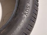 a close up of a tire on a white surface with a white background