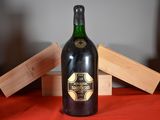a bottle of wine that is sitting on a table