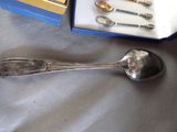 a silver spoon and a silver spoon and a silver spoon and a silver spoon and a silver spoon and a silver spoon and a silver spoon and a silver