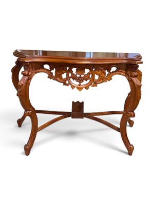 a wooden table with a glass top on a white background