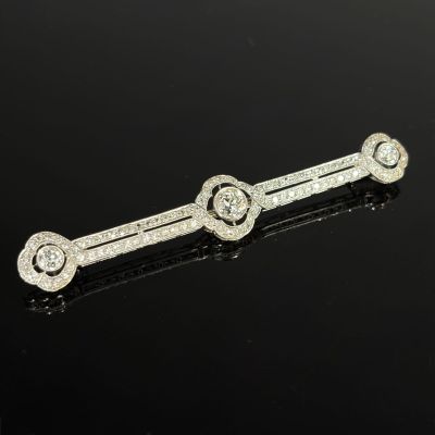 a pair of diamond ear clips