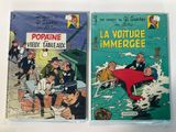 lot of 2 vintage french comic books, the adventures of tintin and the adventures of tintin and the adventures of tintin and the adventures of tintintin
