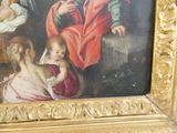 a painting of a man and a woman with a child