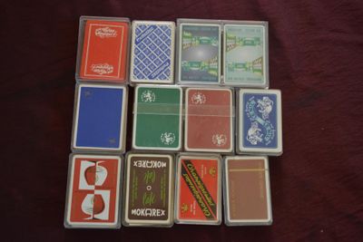 Lot de 12 jeux publicitaires de 52 cartes (non recomptés) do…