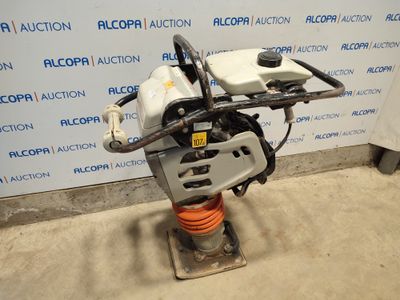 a close up of a machine on a stand in a room