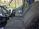 the interior of a van with the front seats down and the passenger seat down