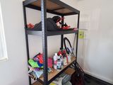 a shelf that has many items on it in a room